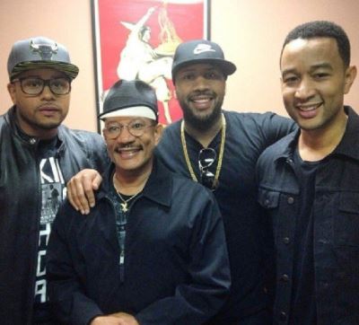 Vaughn Anthony Stephens with father Ronald Stephens and siblings Ronald Stephens II and John Legend